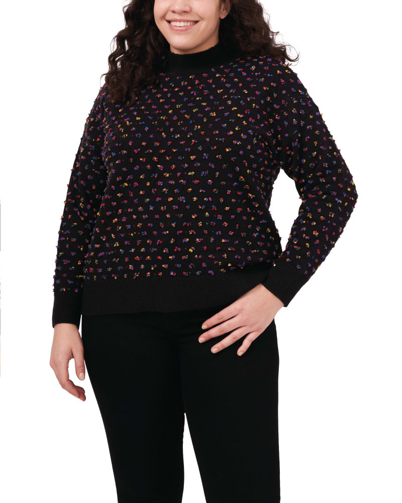 Front of a model wearing a size 1X Lucille Mockneck Dot Sweater in RICH BLACK by CeCe. | dia_product_style_image_id:263675